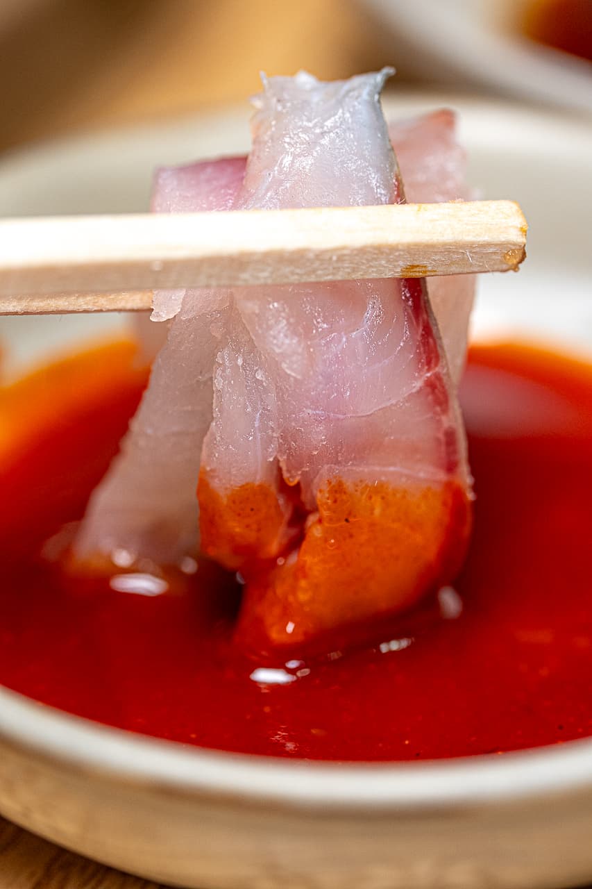 Jangssi Haenyeo-jip Bada Hana flatfish sashimi close-up: thick slices with a lingering natural sweetness